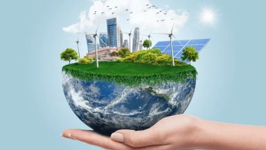 Main qui tient une planète terre