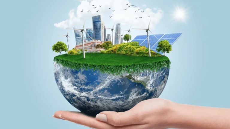 Main qui tient une planète terre